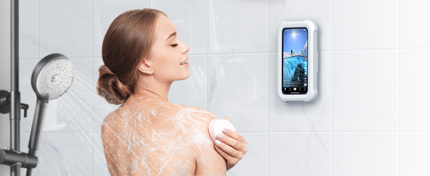 Woman using shower phone holder