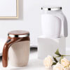 White and brown automatic stirring cups